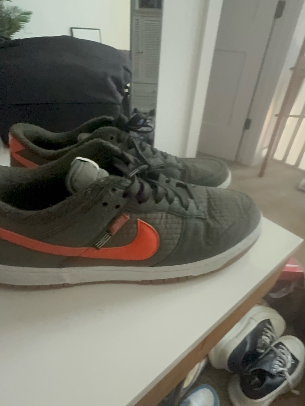 Nike Men’s Olive Green Sneakers with Orange Swoosh